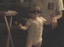 Adrianna wearing Daddy's sunglasses