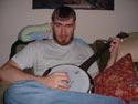 Greg playing his banjo